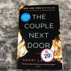 The Couple Next Door - paperback book